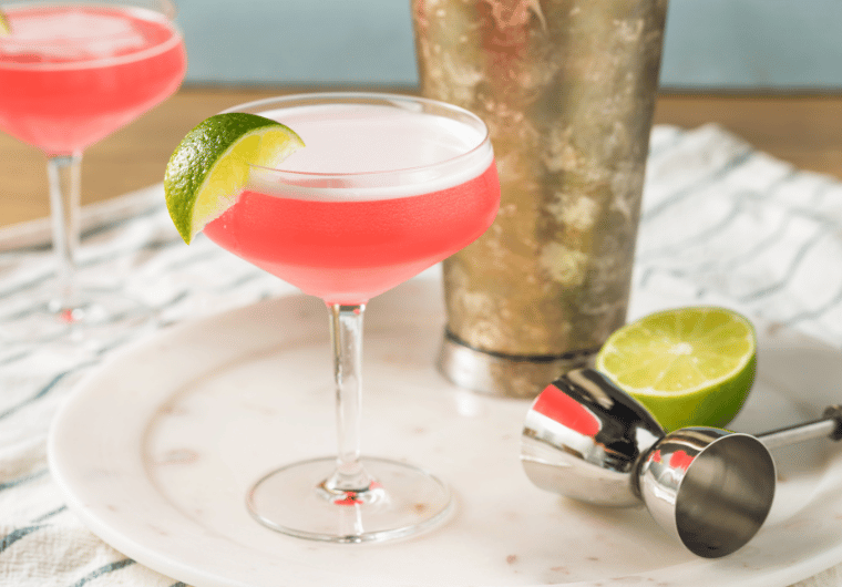Cosmopolitan mocktail in a coupe glass with lime garnish