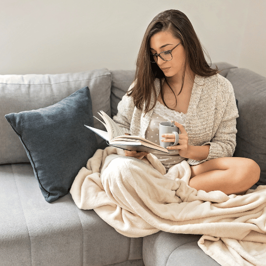 How To Get Started With Mindfulness Meditation: Resource Guide | Woman reading a book