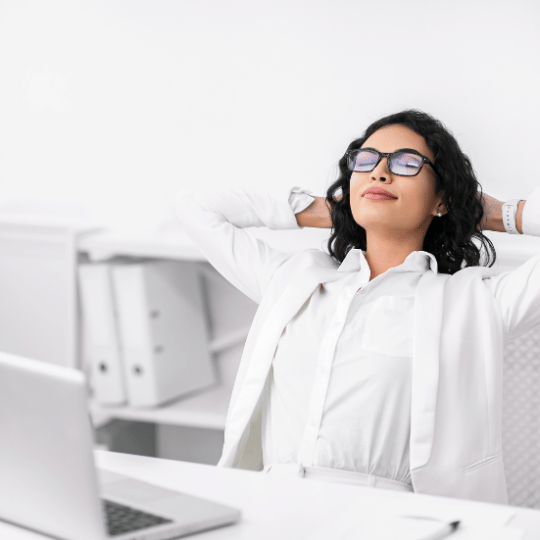 The Pomodoro Technique: How To Make it Work For You | A woman relaxing in office