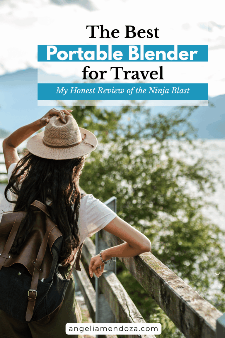 The Portable Blender I Can't Travel Without: My Honest Review of the Best Portable Blender for Travel | Angelia Mendoza Woman traveler with backpack and sunhat overlooking a scenic lake, representing travel lifestyle with the best portable blender for smoothies on the go. | Angelia Mendoza