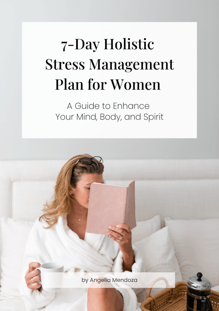 Woman in a white robe reading a journal and drinking coffee—a peaceful moment representing a holistic stress management plan for women.